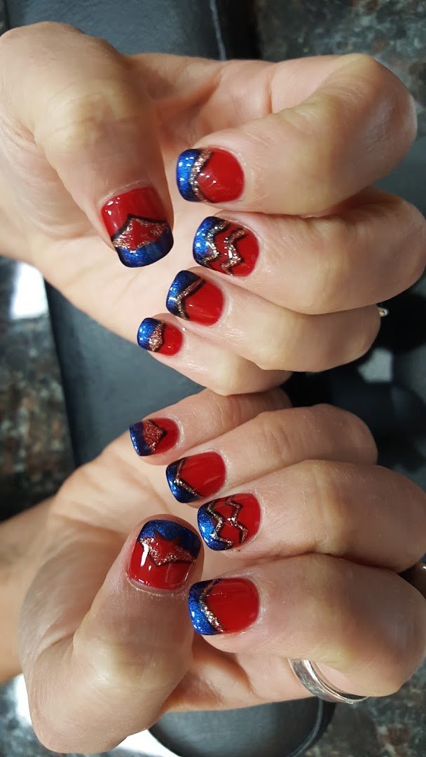 Manicured nails on display at a nail salon.