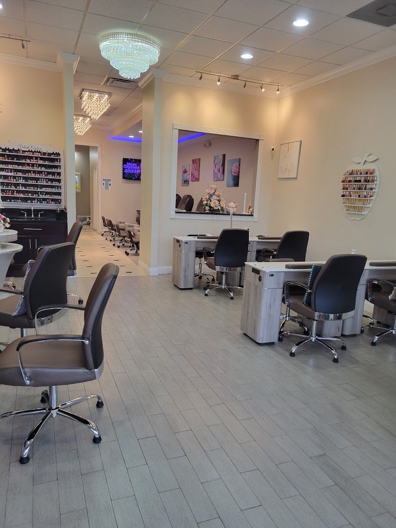 Acrylic nail sets arranged inside the salon.