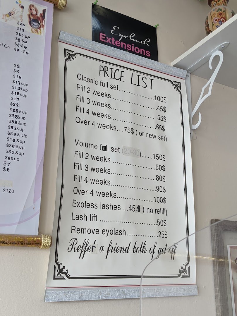 Clean salon interior with nail care stations.